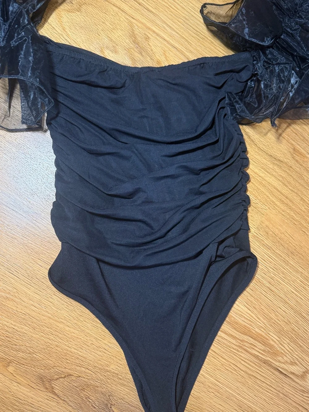 Mariah Davis Black Ruffle- off the shoulder body suit